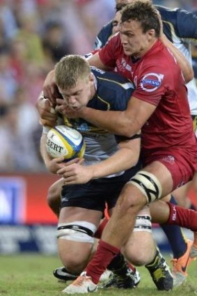 Tom Staniforth takes some stopping against the Reds.