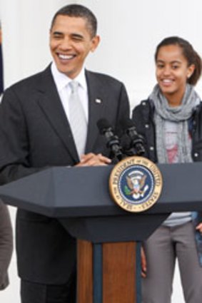US President Obama with his daughter Malia.