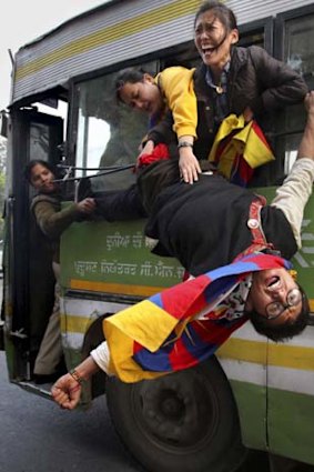 A Tibetan protester outside India-China talks in New Delhi.