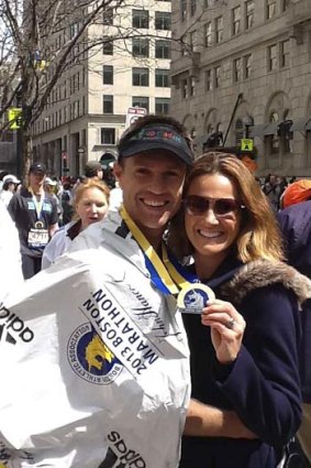 Adam and Angela Clarke moments after he finished the marathon.