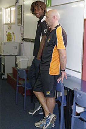 Former West Coast champion Peter Matera and current star Nic Naitanui mentoring Pilbara children.