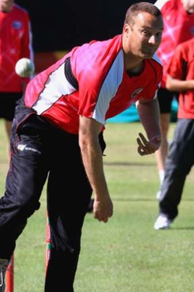 Hands-on boss ... Stuart Clark bowls in the nets during the Twenty20 Champions League in October.