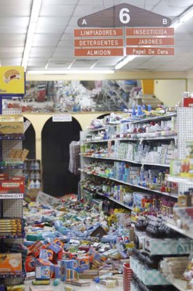 Items fallen from the shelves litter the aisles inside a grocery store in downtown Calexico, California, after an earthquake struck the area.