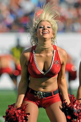 A cheerleader of the Tampa Bay Buccaneers enjoys the warmer climes of Florida.