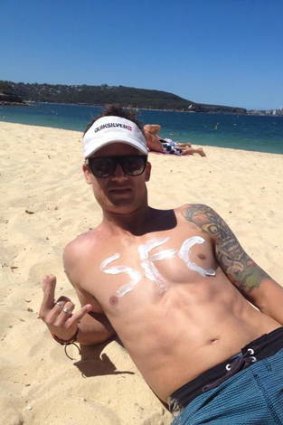 Giveaway ... Joel Griffiths poses on Balmoral Beach on Thursday.