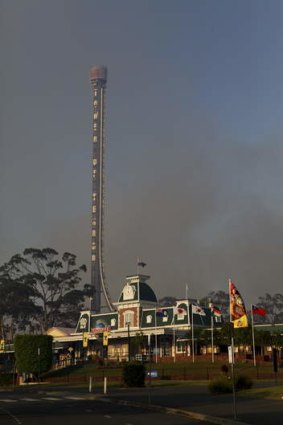 Dreamworld's Tower of Terror ride got a little scarier with nearby bushfires.