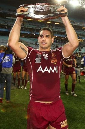 Hip and tuck ... Greg Inglis is racing to be fit for Origin II after pulling out of Souths' match against Penrith tonight.