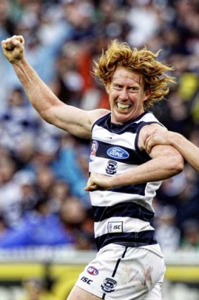 That premiership feeling... then Cats captain Cameron Ling celebrates a goal in the final quarter of the 2011 grand final.