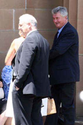 Marriage examined ... millionaire builder Frank Haschka (right) outside court.