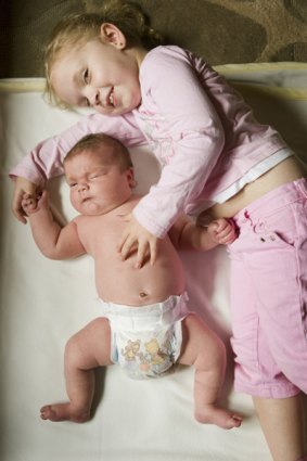 Big boy ... Bree Hayman, 4, cuddles baby Cordell, who weighed 6.52 kilograms at birth.