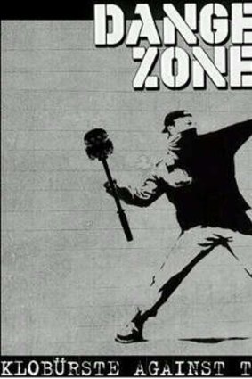 A German protest poster reimagines Banksy via the bathroom.