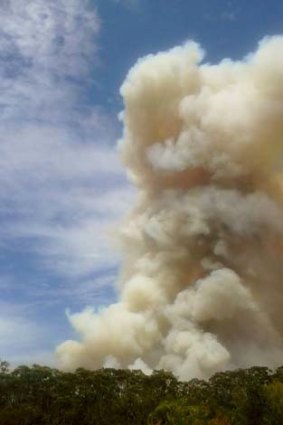 Smoke billows over North Stradbroke Island.