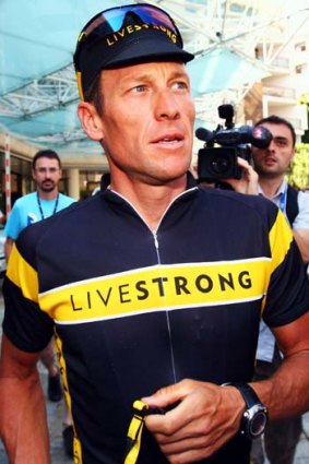 Lance Armstrong announces he is to step down as chairman of the Livestrong cancer-fighting charity.