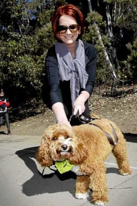 Ms Gillard and her cavoodle Reuben at a RSPCA walk in May.