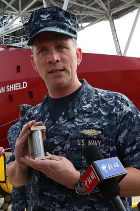 Search mission: US Navy Captain Mark Matthews with an acoustic "pinger", to be used in the hunt for flight MH370's black box.