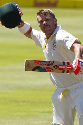 Australia's David Warner celebrates his century on the first day of the Third Test.