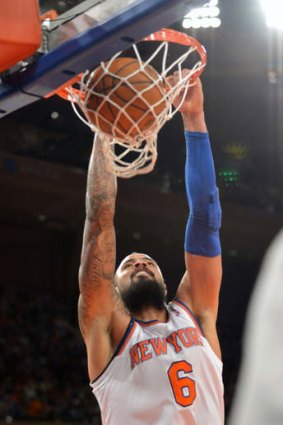 New York Knicks centre Tyson Chandler dunks the ball during the NBA game against the Cleveland Cavaliers at Madison Square Garden in New York.