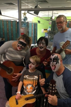Jack Woodhams with parents Paul and Karyn Woodhams and his grandparents during a music therapy session with music therapist Matt Ralph, at Sydney Children's Hospital, Randwick.