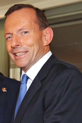 Begrudgingly happy ... Opposition leader Tony Abbott.