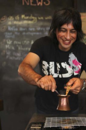 Claude Sawaya uses traditional and exotic methods to brew coffee.