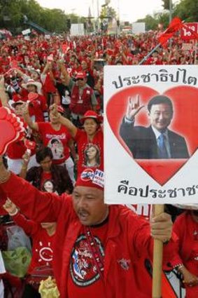 Loyalists of billionaire Thaksin Shinawatra rally for their ousted leader's return.
