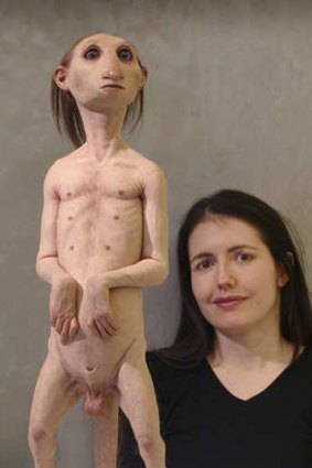 Artist Patricia Piccinini with a section of her work entitled Leather Landscape.