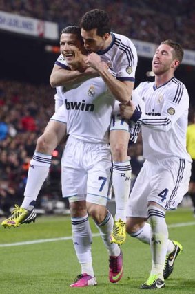 Back on top &#8230; Cristiano Ronaldo celebrates one of his two goals against Barcelona.