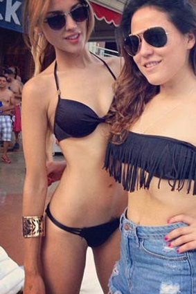 Eiza Gonzalez (left) was in Las Vegas the same weekend as Liam Hemsworth, and posted photos of herself partying poolside with a friend.