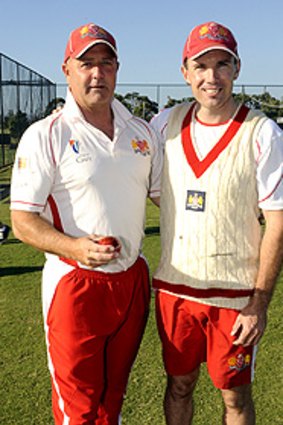 Casey-South Melbourne coach Mark Ridgway with Michael Hansen.