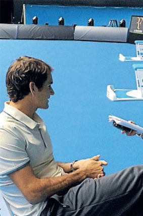 Tennis dreamtime: chatting with Roger Federer on Rod Laver Arena, before talking to Laver about Federer.