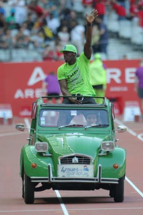 Vintage effort: Usain Bolt in Paris earlier this month.