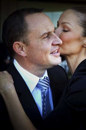 Happy days: Chris Waller gets a kiss from wife Stephanie after breaking the record.