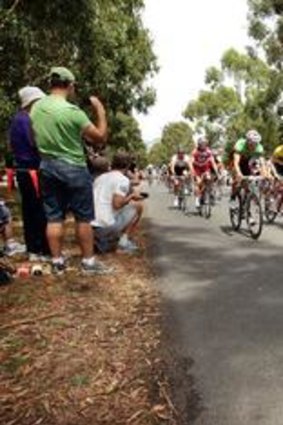 Fans cheer on riders in the "battle of Buninyong".