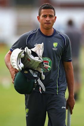 Usman Khawaja of Australia walks to the Lord's nets.