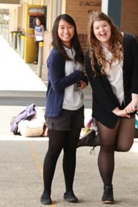 Mikahlia Holmes (right) with a friend at Lake Munmorah High School.