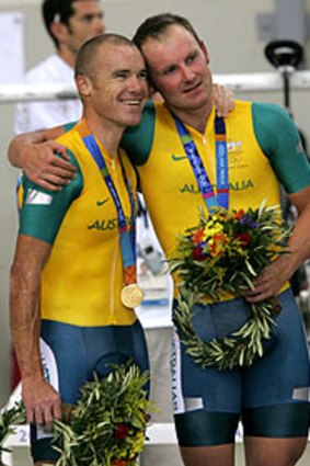 Graeme Brown (right) with Stuart O’Grady after winning gold in the madison at the 2004 Olympics.
