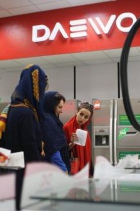 Business opportunities: Iranian women shop at a Daewoo appliance store in Isfahan.
