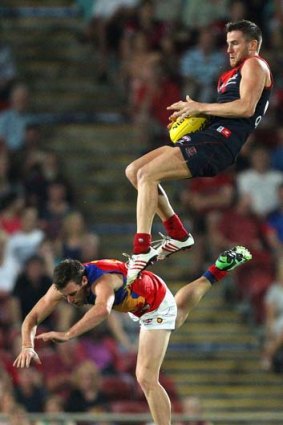 Howe high: Melbourne's Jeremy Howe launches at TIO Stadium.