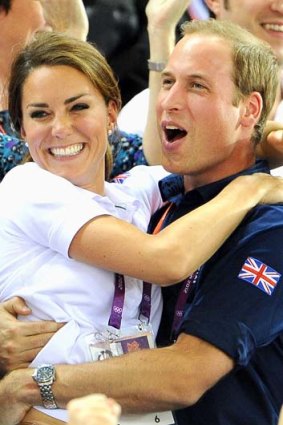 Velodrome victory for Team GB ...  Catherine, Duchess of Cambridge and Prince William celebrate a gold medal ride by Chris Hoy in the track cycling.