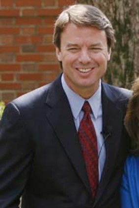 U.S. Presidential candidate John Edwards, with his wife Elizabeth, will face six felony counts relating to alleged misuse of campaign funds.