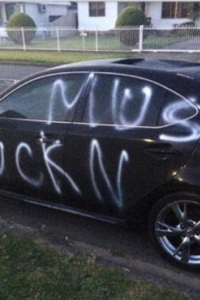 A car which was damaged overnight and daubed with anti-Muslim slogans in Miller near Liverpool. 