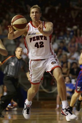 Wildcats veteran Shawn Redhage will be a key player when Perth open their new arena against Adelaide on Friday night.