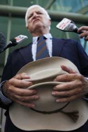 Bob Katter arrives at Parliament House in Canberra for further talks with Julia Gillard and Tony Abbott.
