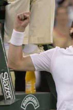 Britain's Andy Murray celebrates beating Poland's Jerzy Janowicz in their men's singles semi-final match.
