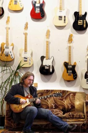 String saviour ... Steve Jackson in his shop. Customers hugged him after buying vintage guitars with their super.