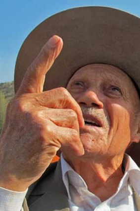 Sergio Catalan, the Chilean livestock farmer who first spotted the survivors of a plane crash in 1972, points to the skies.