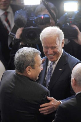 Meet and greet ... US Vice President Joe Biden (C) with deputy Prime Minister and Minister of Defence of Israel, Ehud Barak (L), at the Munich Security Conference.