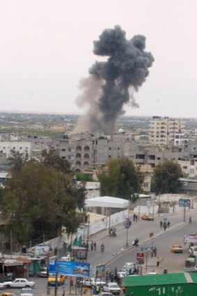 Smoke rises after an Israeli air strike.