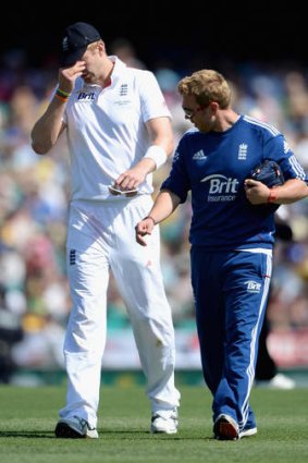Bad start: England bowler Boyd Rankin goes off injured.