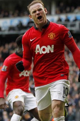 Equaliser: Wayne Rooney celebrates his second goal.